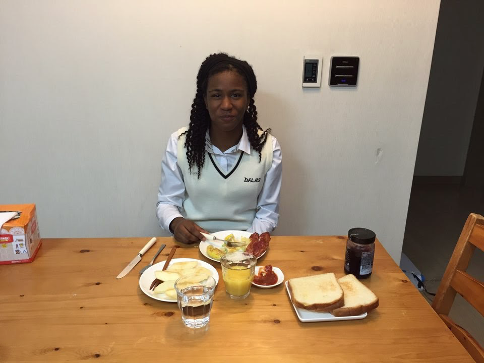 Simone Eating Breakfast